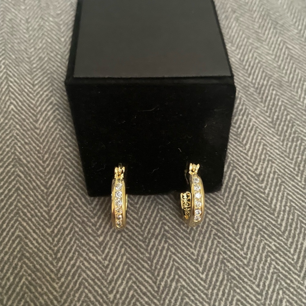 Yellow gold tone hoops with cubic zirconia set in 925 Sterling Silver